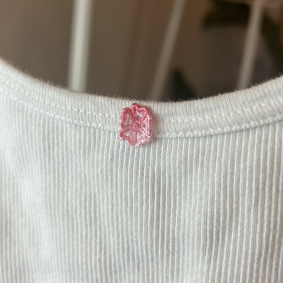 Brandy Melville white tank top with adorable flower detail! - Picture 4 of 4